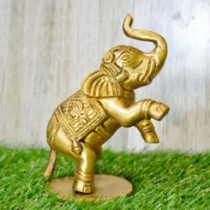 Aakrati Yellow Small 4 inch Brass Cute Elephant Showpiece- Use For Home or Office or Paper Weight